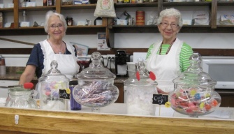 Myrna Watt and Diana Hummerstone greeted people at the 2019 Arts Festival's old time country store